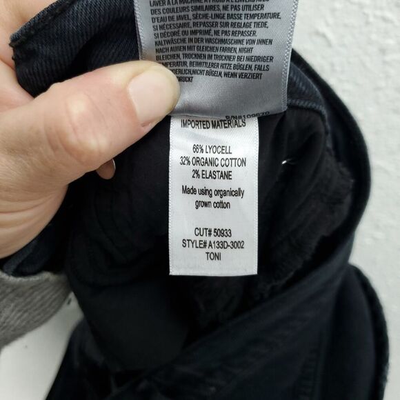 AGOLDE Toni Mid Rise Straight Raw Hem In feral Revolve Jeans - Picture 15 of 16